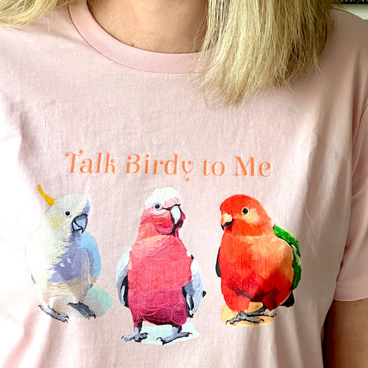 closeup image of an australian bird themed tshirt with a galah, king parrot and cockatoo designed in Australia by Kirsty Mcintyre