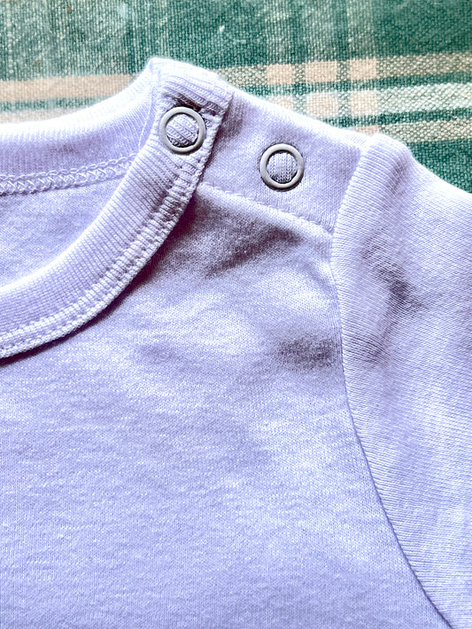 Baby one piece with fierce magpie design