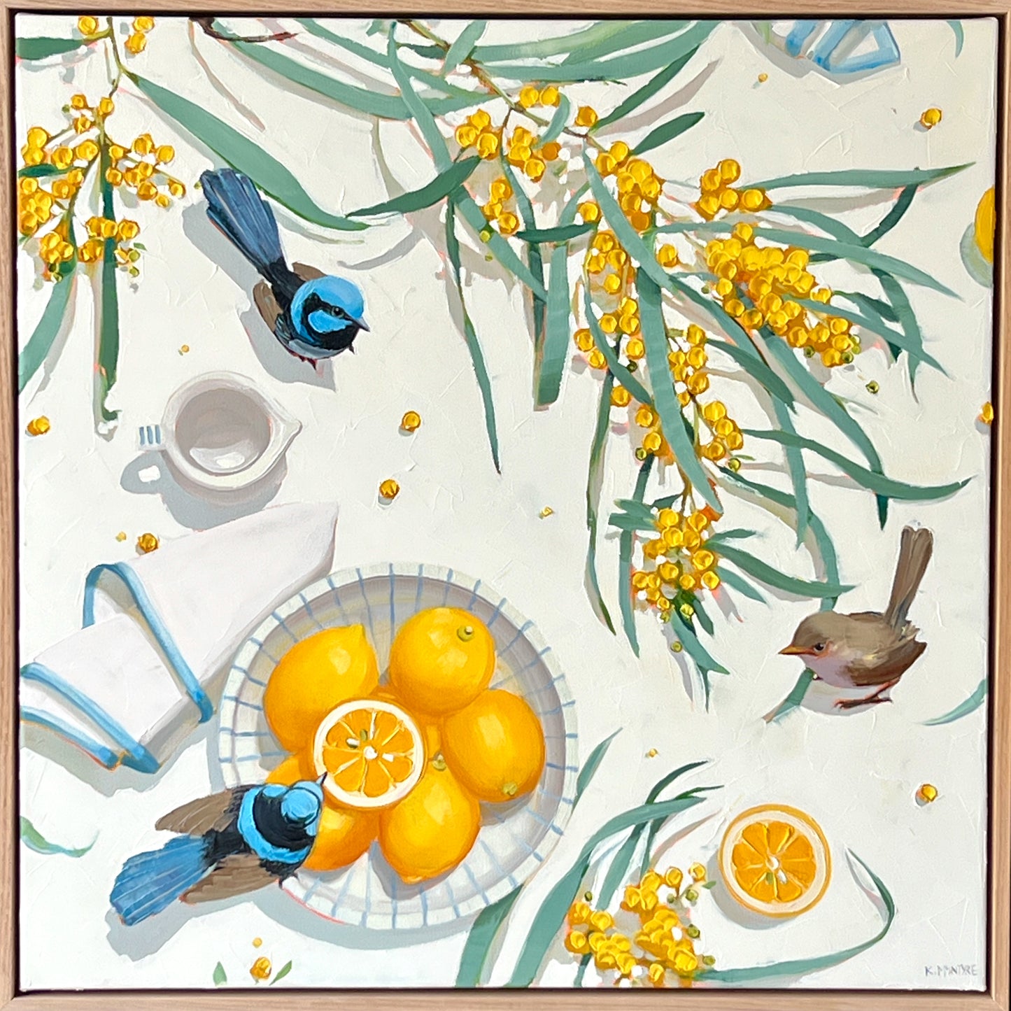 original artwork by Kirsty Mcintyre featuring australian blue wren birds and wattle flowers on a tabletop with lemons