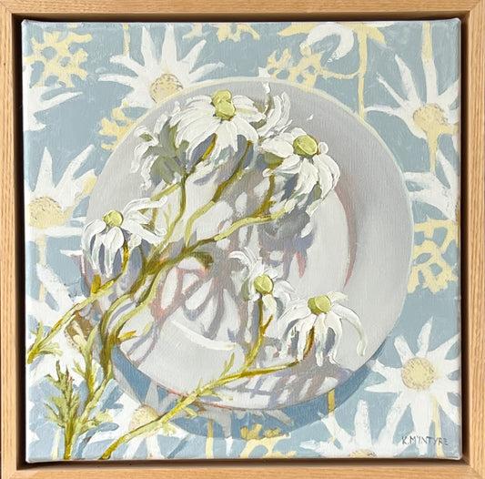 Framed artwork of a white dove with floral elements on a light blue background. Flannel flowers with Jocely Proust fabric original art by Kirsty Mcintyre, Australian artist