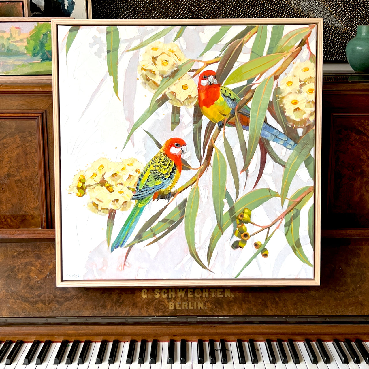 Eastern rosella couple with blossom