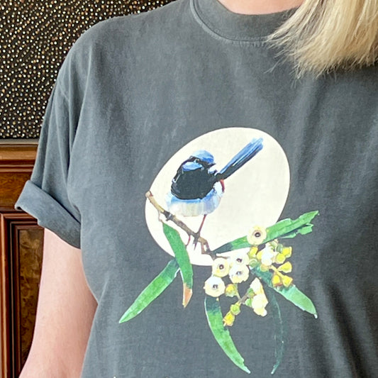 kirsty mcintyre art original tshirt design- "blue wren and blossom" shows a superb blue wren perched on a branch of flowering gum blossom, closeup worn by a model