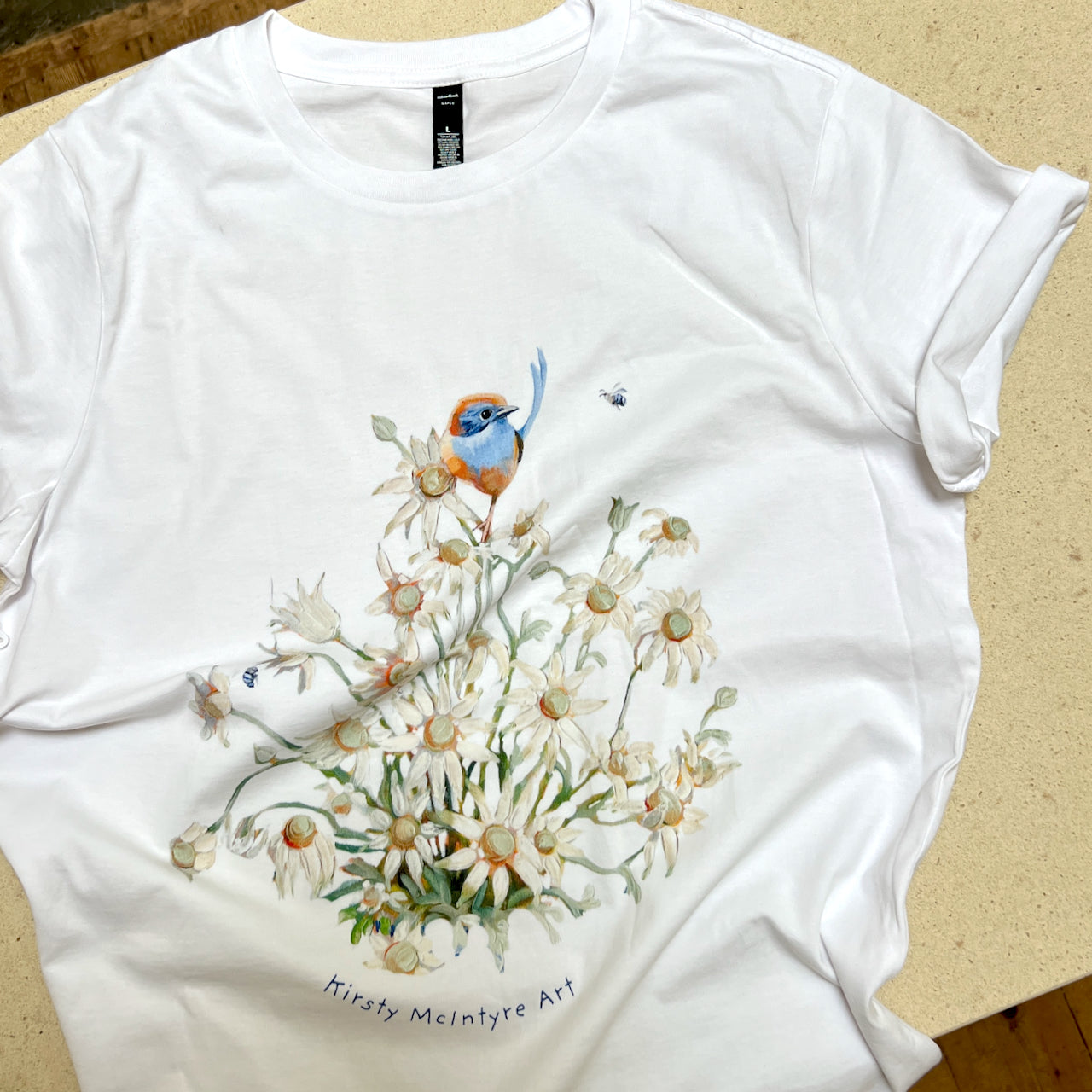 womens maple tshirt featuring an emu blue wren with flannel flowers in an original design by bird lover and artist Kirsty McIntyre Art