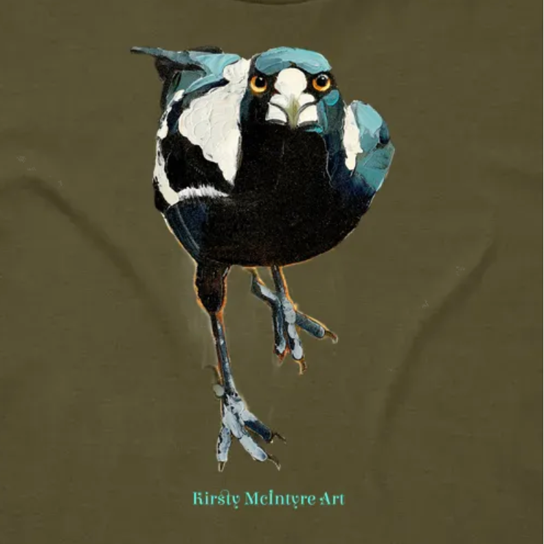T-shirt with a colorful magpie australian bird staring intently design on a brown background tshirt by Australian artist Kirsty McIntyre