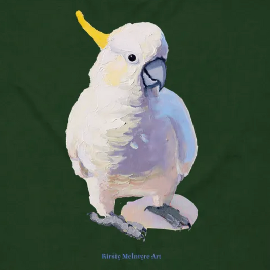 White cockatoo parrot with a yellow crest on a green background, artist Kirsty McIntyre