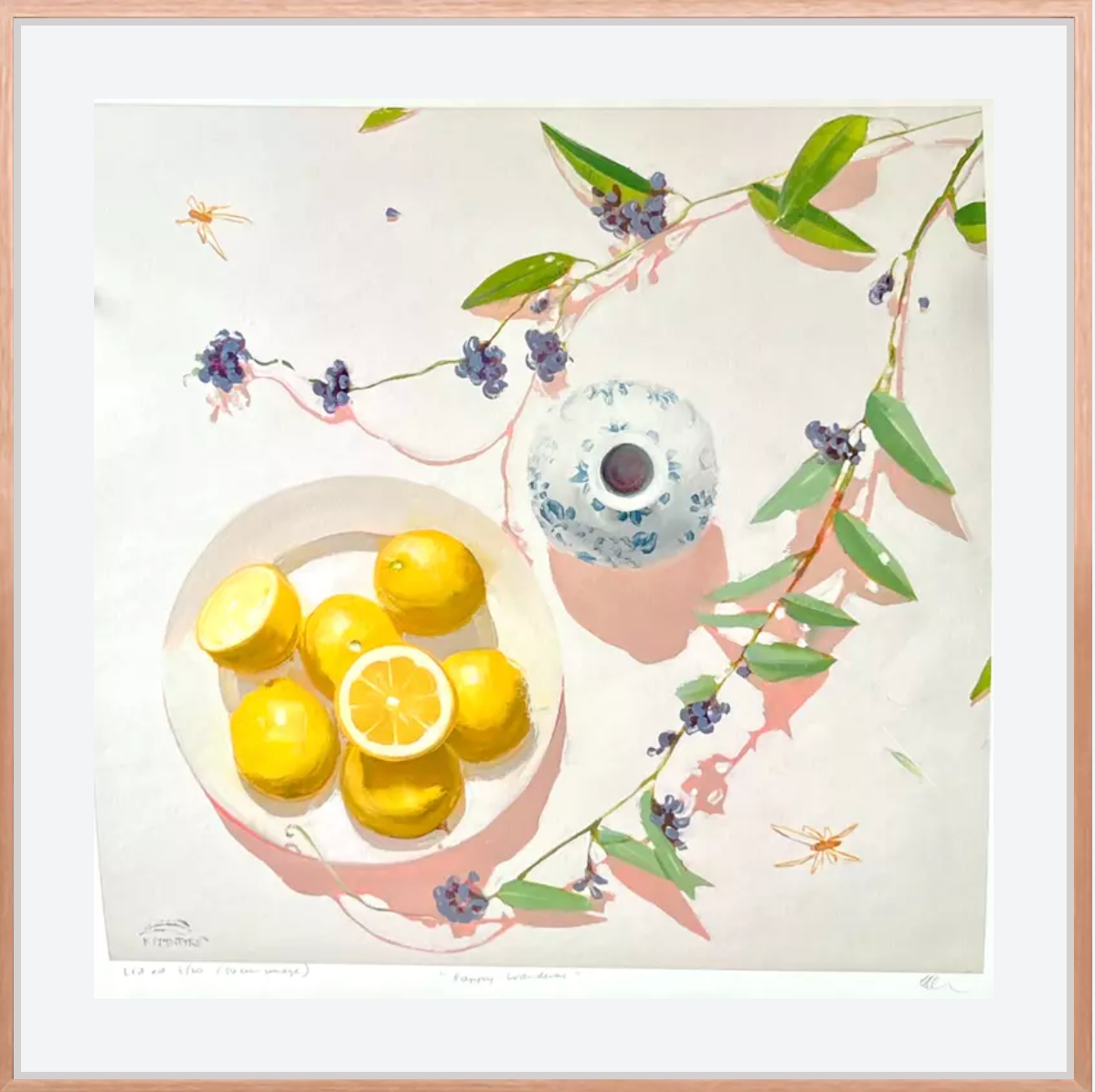 Framed giclee print artwork with lemons, a teacup, and floral elements on a light background
