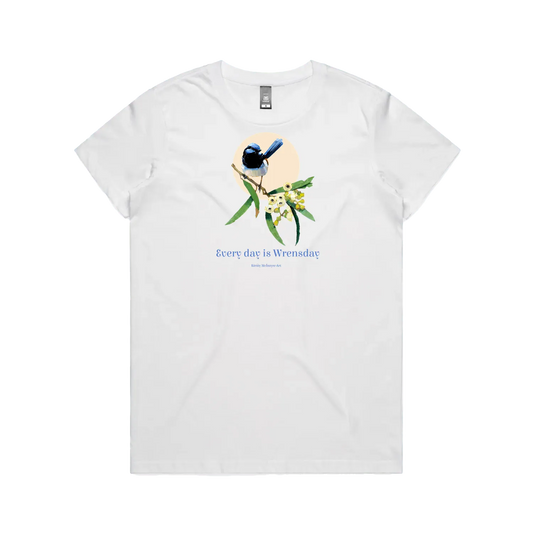 White front flat lay tee blue wren superb Bird perched on a branch with flowers and leaves on a light pink background, featuring the text 'Every day is Wrensday'. original design by Kirsty McIntyre